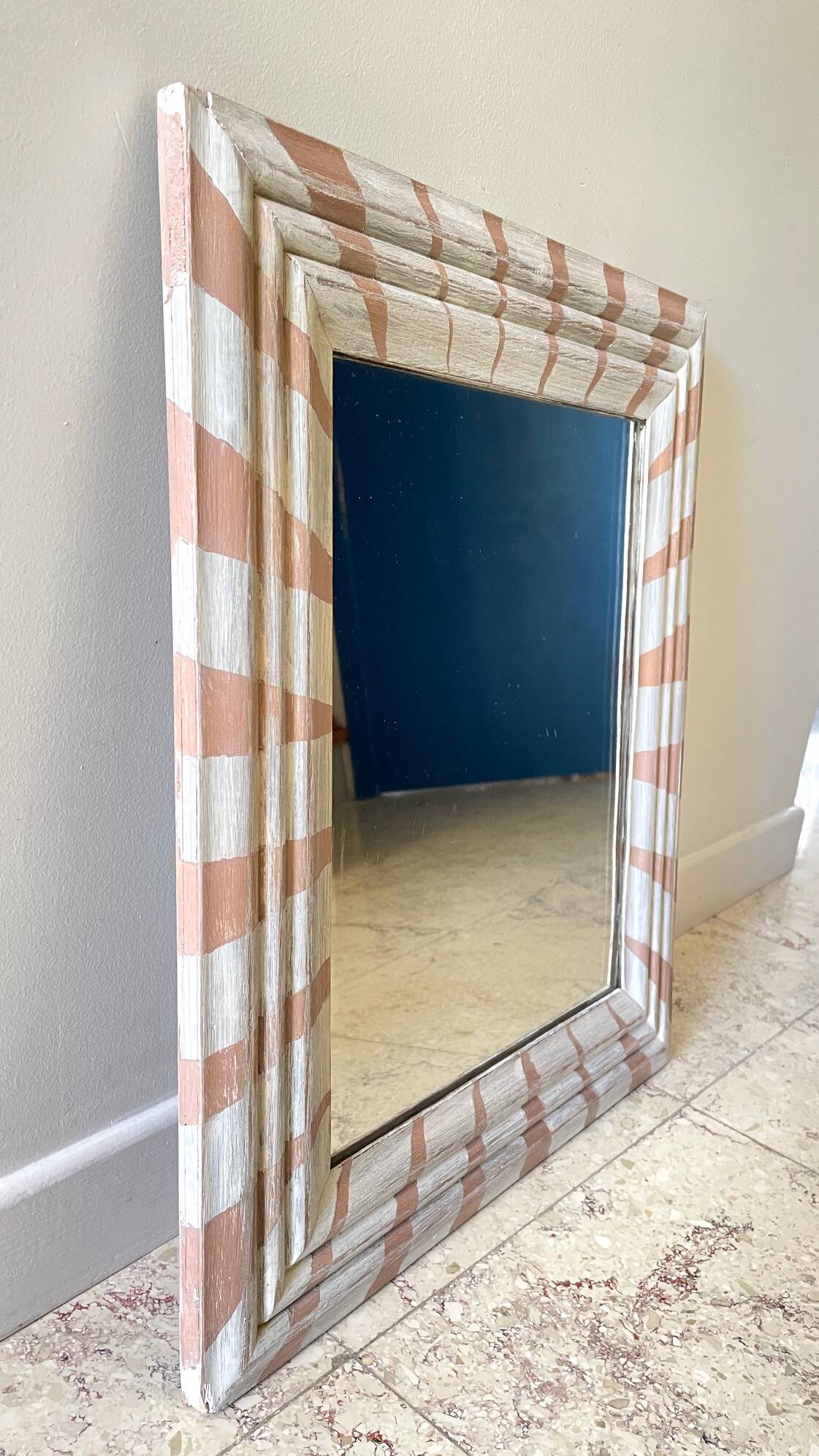 Old mirror in hand-painted wood