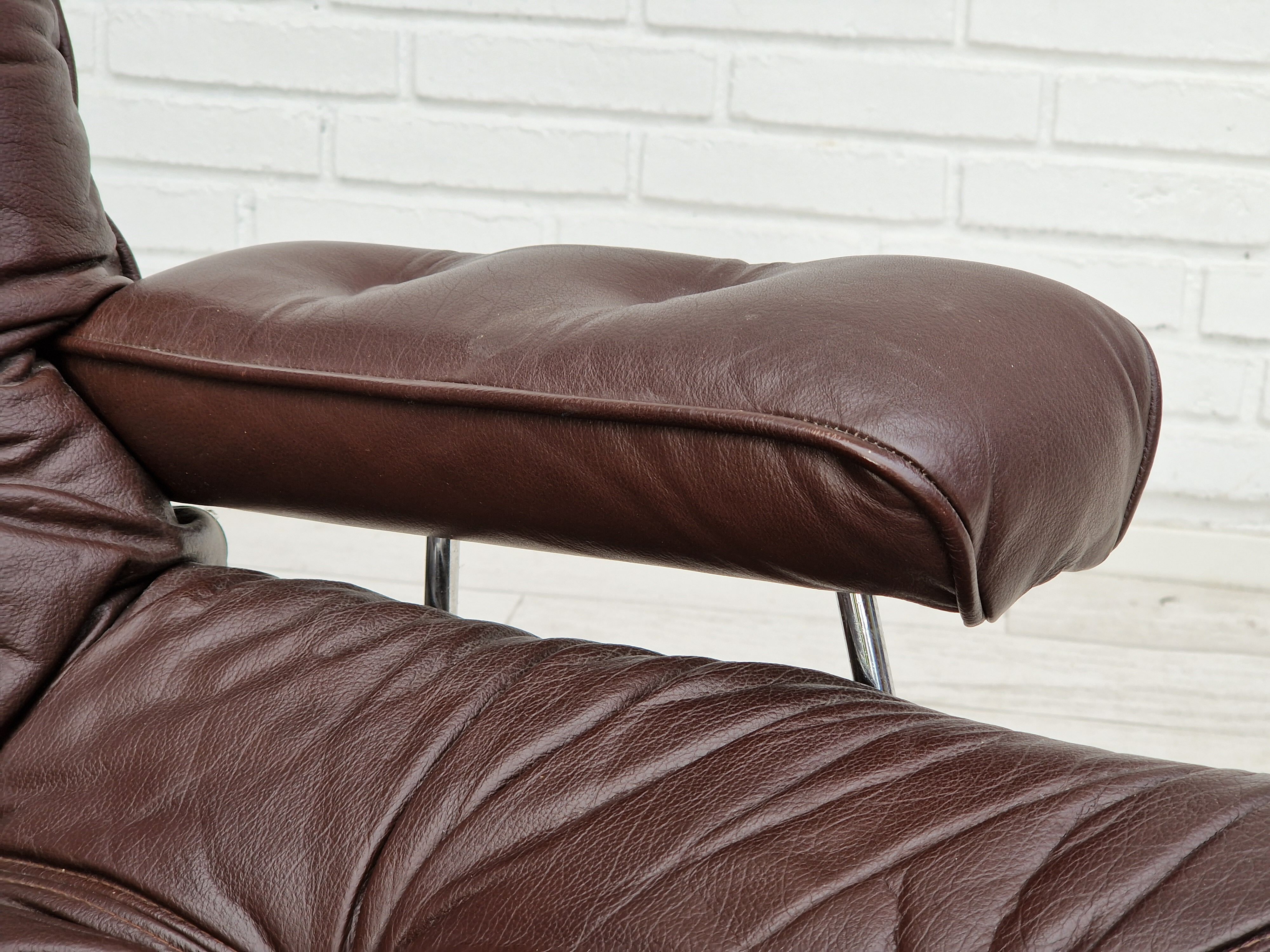 Vintage danish swivel leather armchair 1970s