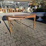 12-foot round oak table with 7 extensions / 20 people