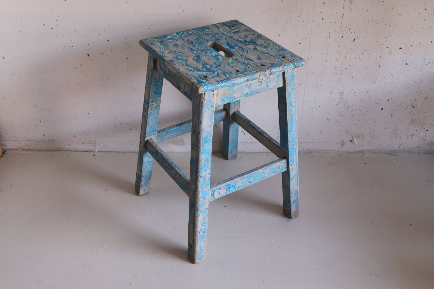 Blue patinated farm stool