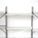 Tomado floor shelf in shades of gray