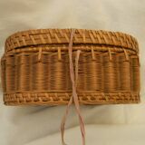 Old padded interior wicker box.