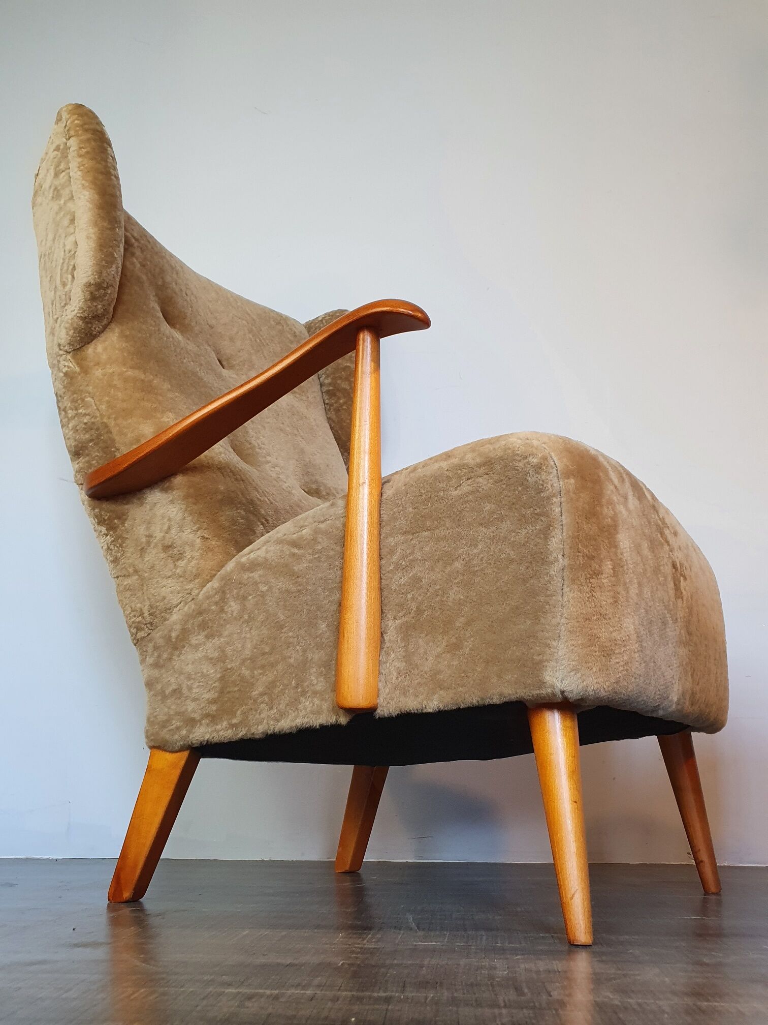 Norwegian sheepskin wing armchair with ottoman 1950