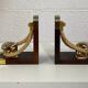 Pair of antique wooden and brass bookends