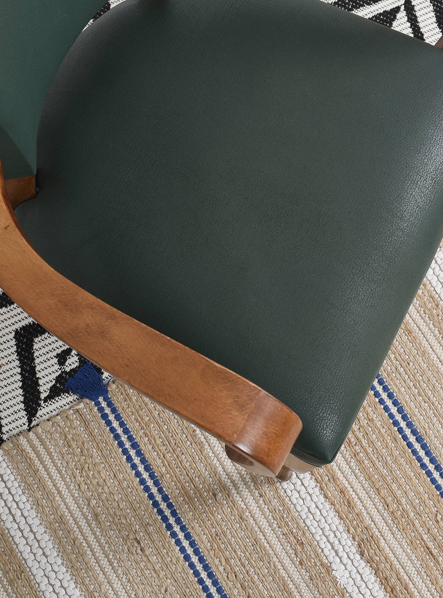 Bridge armchair in green moleskin