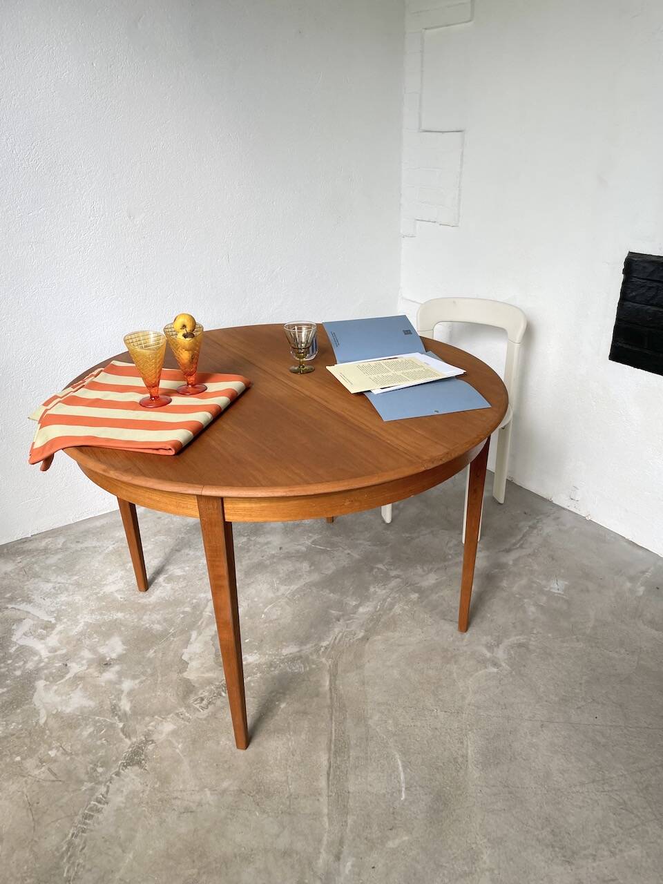 Scandinavian round teak table with extension