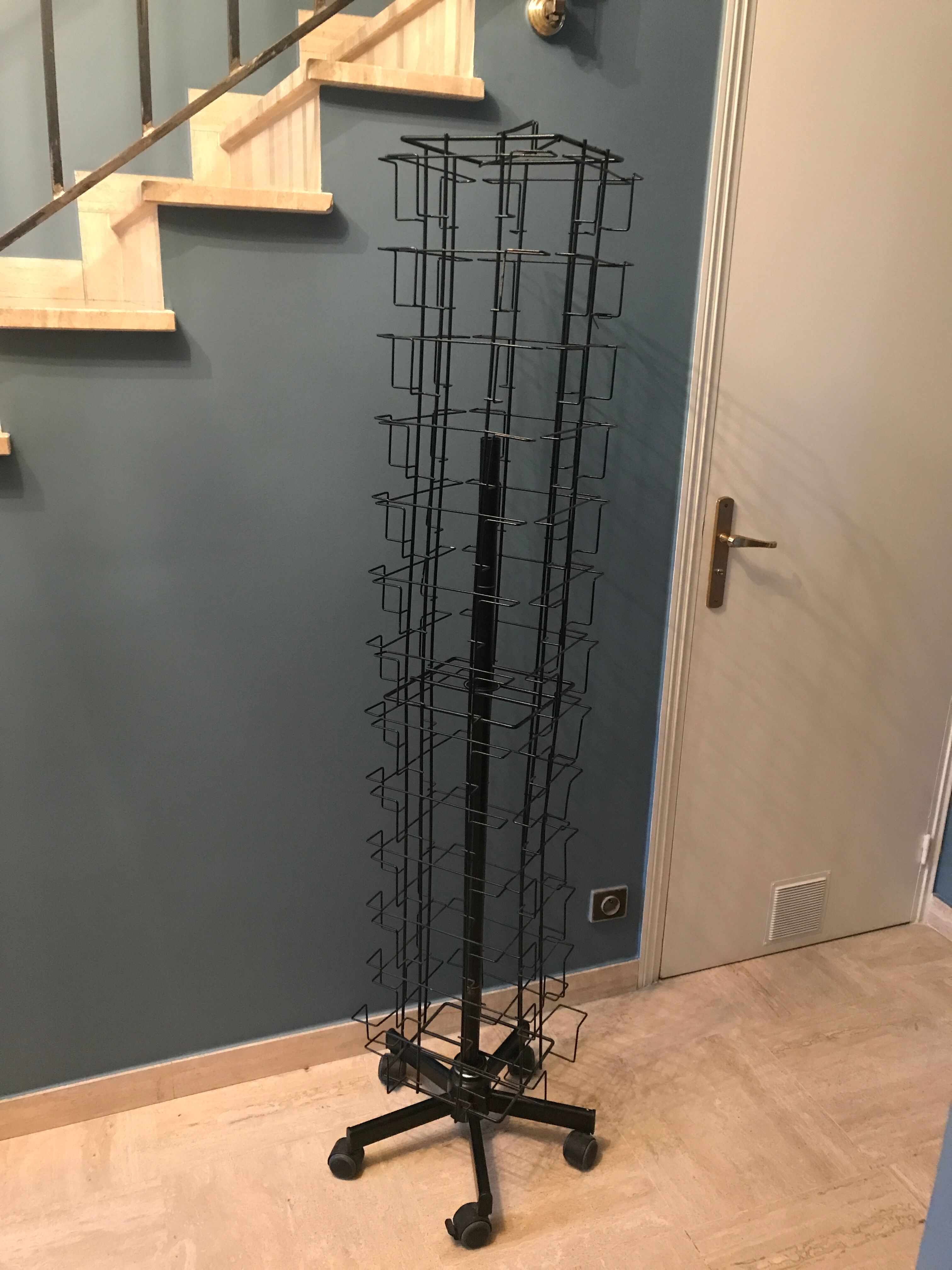 Display postcards and photos in black metal turnstile