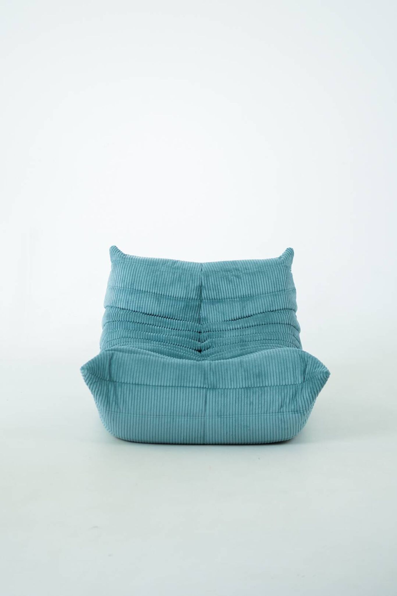 Togo set of armchair and pouf in light blue corduroy