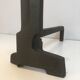 Pair of modernist chenets in cast iron and iron
