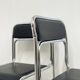 4 chrome metal chairs with black faux leather, 1990