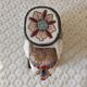 Enamelled ceramic plant holder