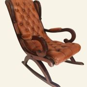 Fauteuil à bascule avec repose-pieds, bois et cuir capitonné