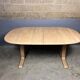 Oval extendable dining table in beech with Danish design.
