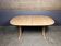 Table à manger ovale extensible en hêtre au design danois.