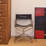 Folding cantilever chair in tubular metal