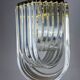 Long mid-century curved Lucite ribbon chandelier in brass, Italy