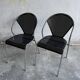 Set of 2 metal chairs with perforated design (1980s)