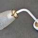 White and gold art deco wall lamp
