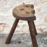 Vintage wooden tripod stool, mountain work, wabi-sabi, shepherd.