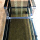 Table basse chromée verre fumé