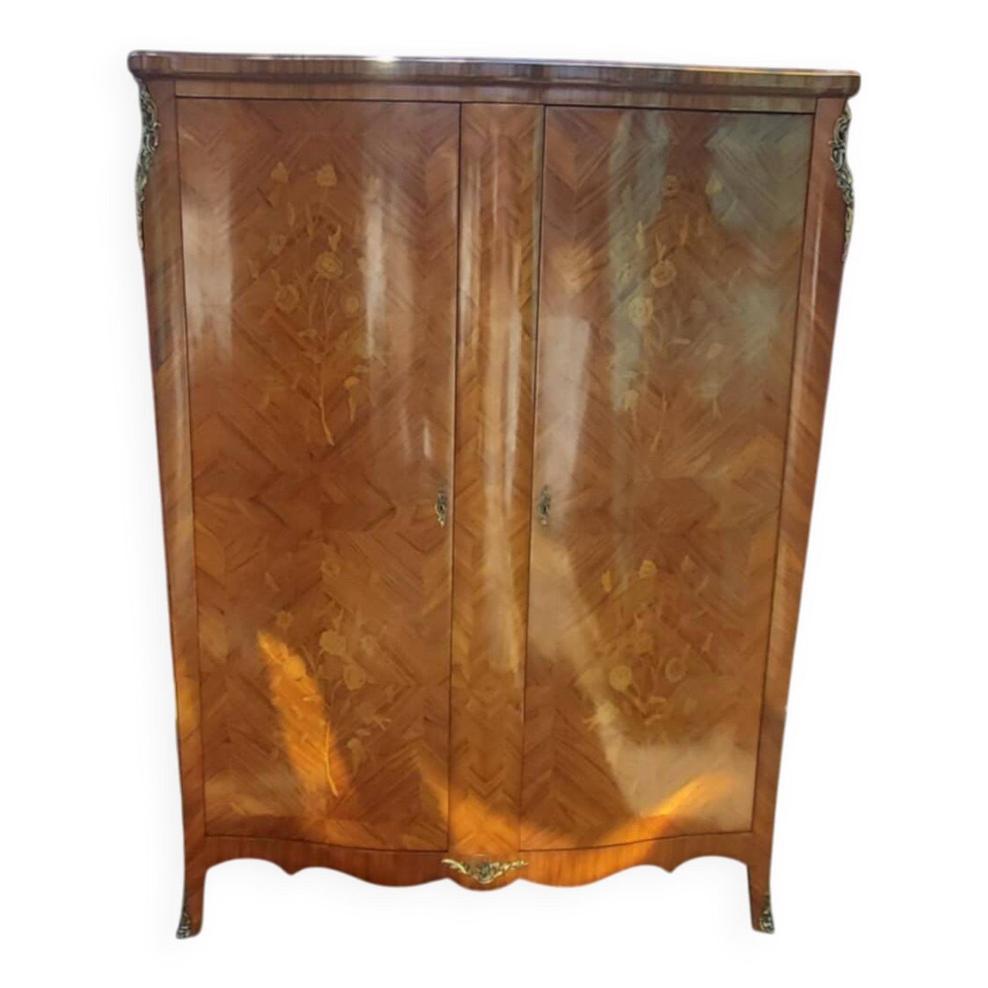 Two-door cabinet with marquetry floral design from the early 20th century.