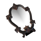 Vintage fiddle mirror to put down.