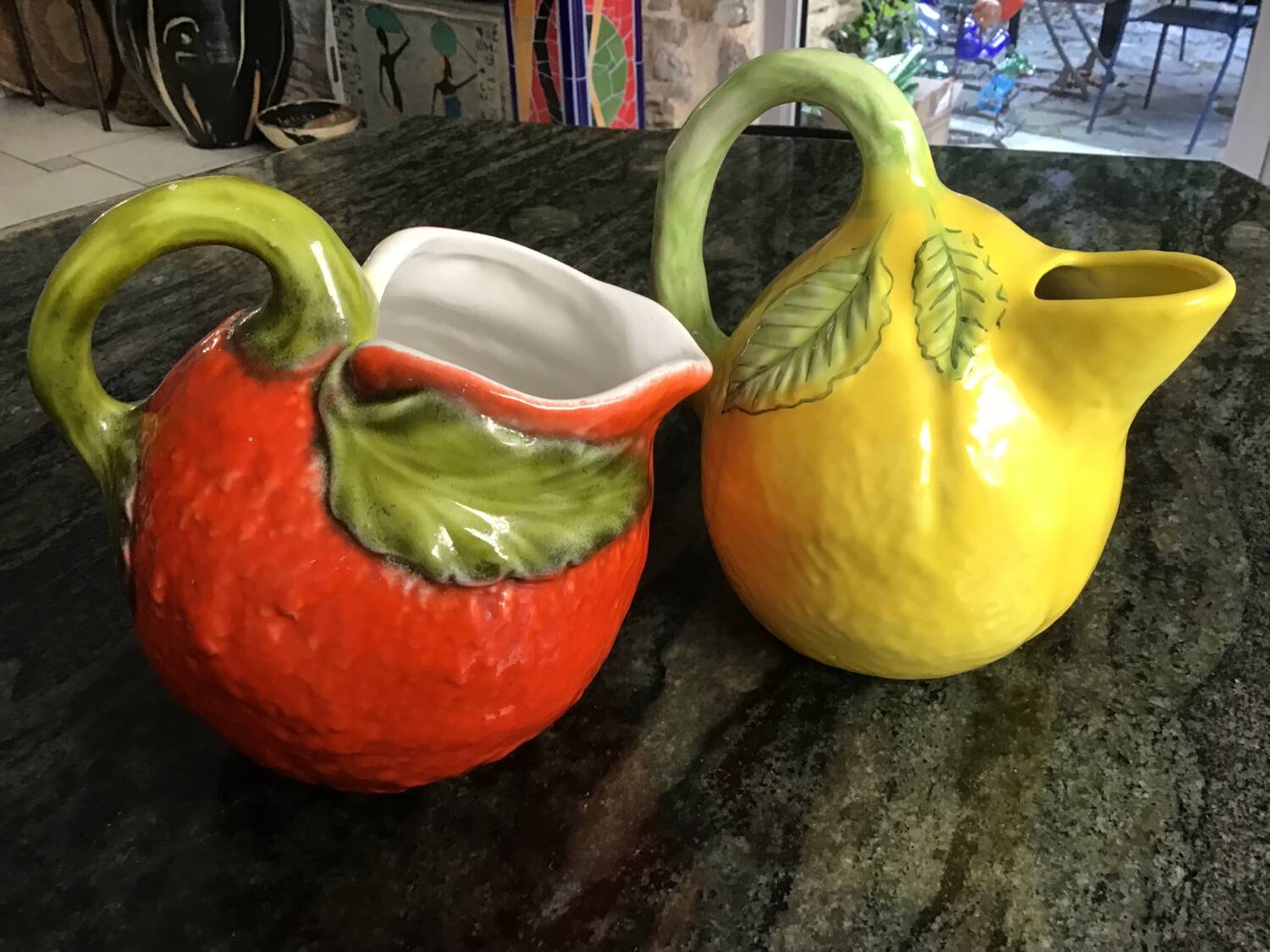 2 lemonade pitchers in slushie: mandarin and lemon