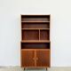 Mahogany library — closed storage and open cubbies, custom-made, 1960s.