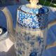 Old coffee service Lunéville with blue lace decoration.