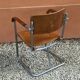 Fauteuil moderniste en multiplex, tubes acier vissés