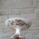 Flat serving compote dish in Terre de Fer HB & Cie with brown floral decoration.