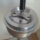 Vintage chrome metal floor ashtray with integrated tray.