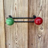 Vintage wall coat rack with 2 red and green wooden hooks