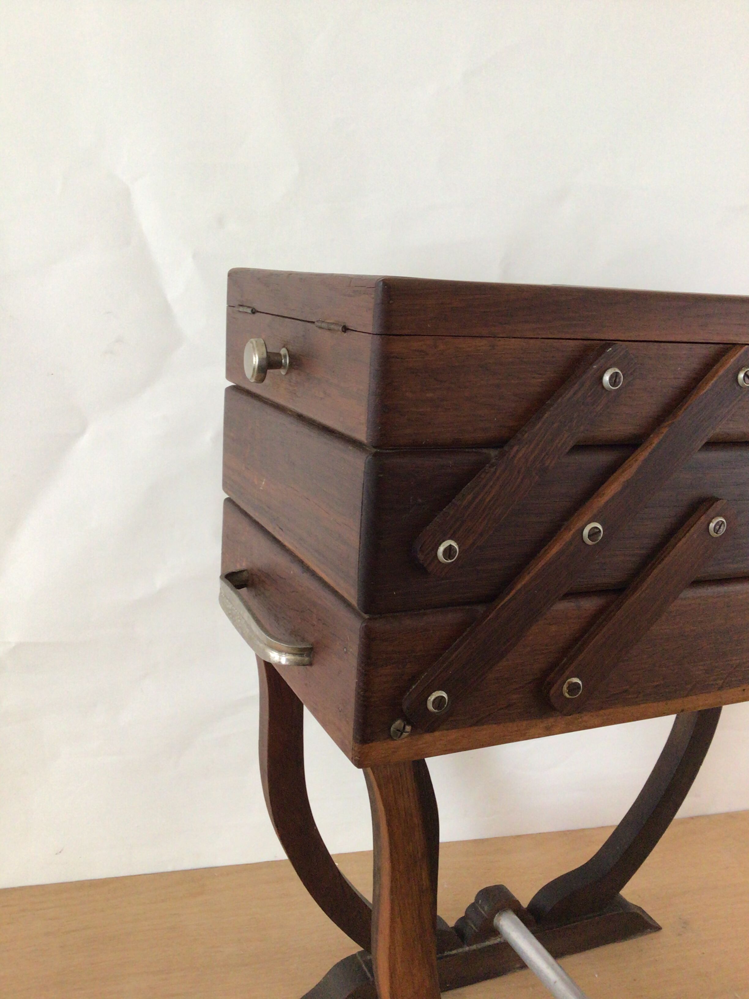 Worker on wooden feet