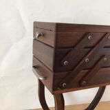 Worker on wooden feet