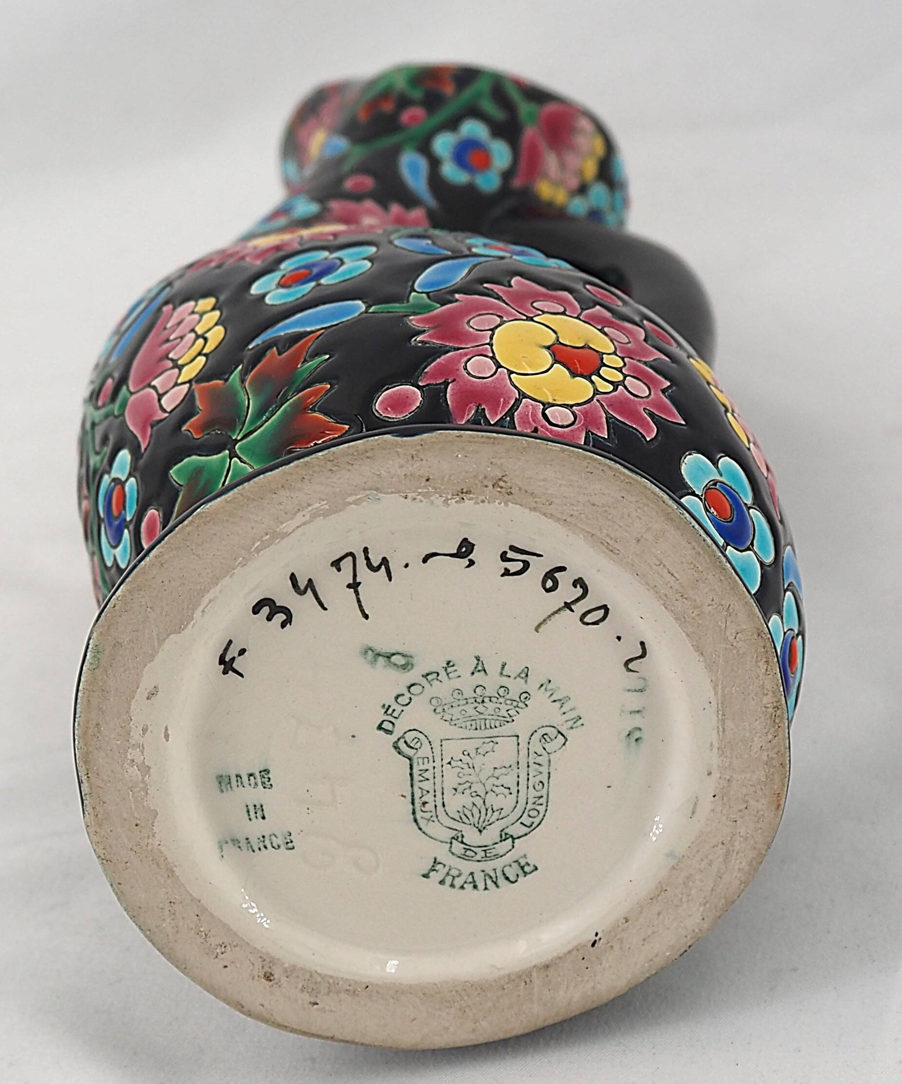 Beautiful Longwy enamel jug, signed, in excellent condition.