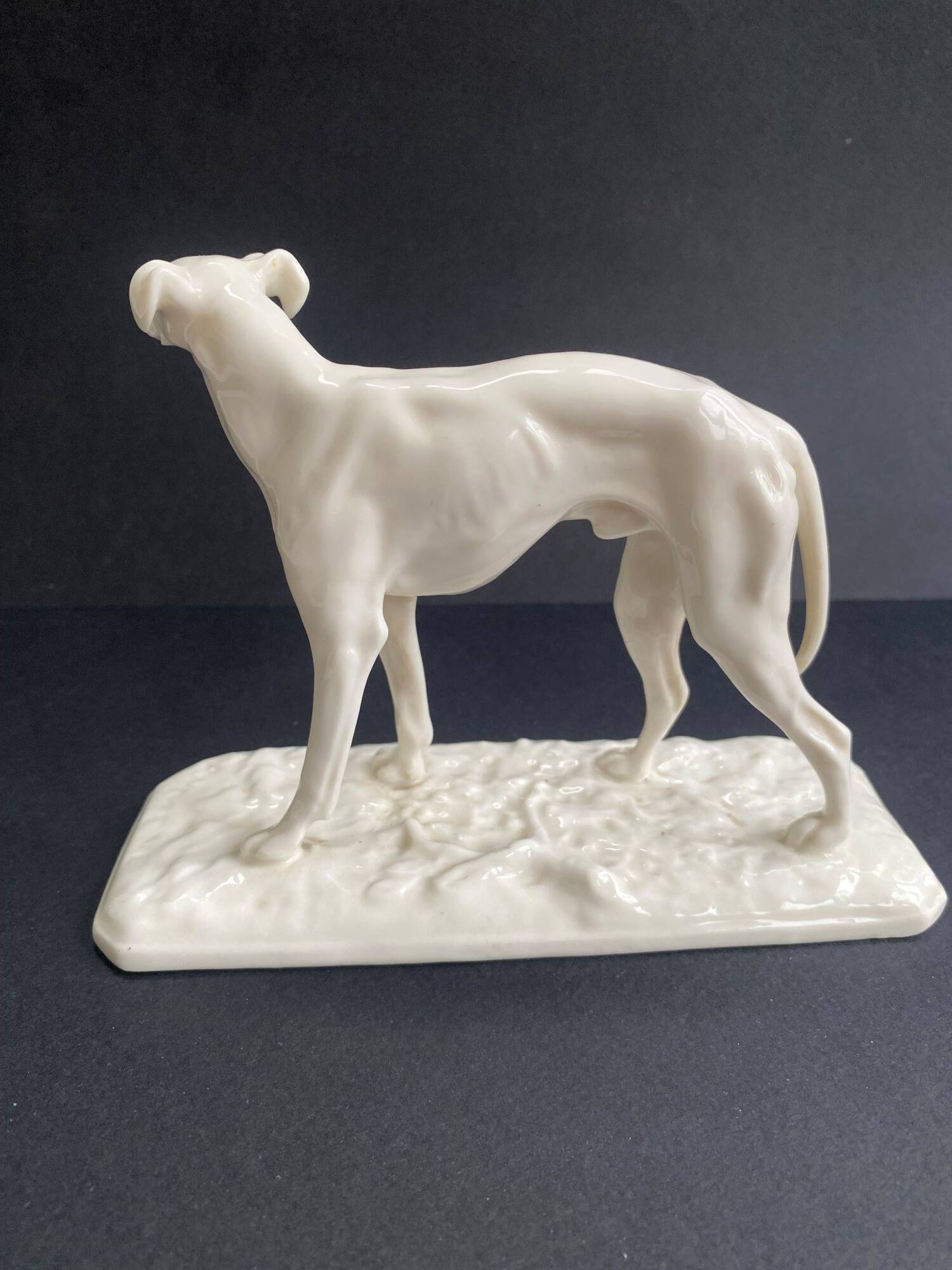 Nymphenburg porcelain greyhound sculpture signed PJ MENE