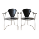 Pair of Linda Arrben armchairs from the 1970s in metal and black leather.