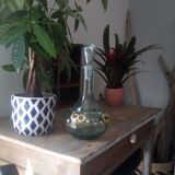 Old carafe bluish glass