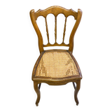 Antique wooden chair, cane seat
