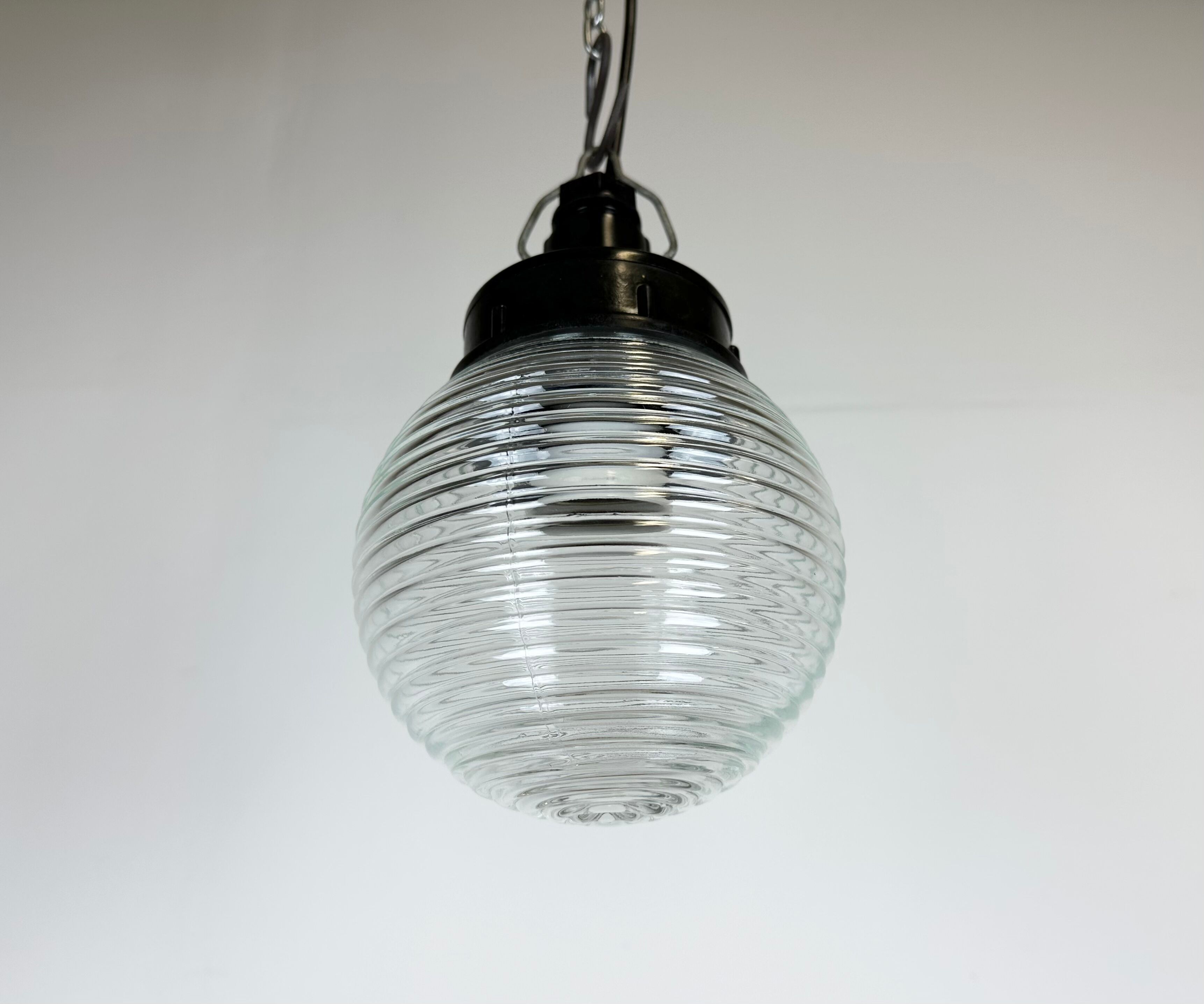 Industrial bakelite pendant light with ribbed glass, 1970s