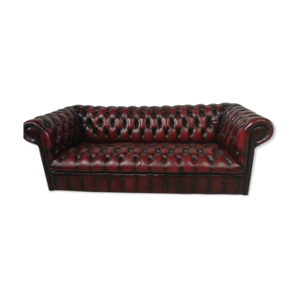 Canapé chesterfield cuir bordeaux trois places capitonné