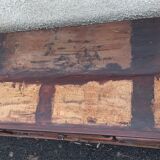 Furniture low in colorful wood. 12 drawers and 1 door