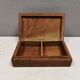 Wooden trinket box for storing jewellery, cigarettes or similar items.