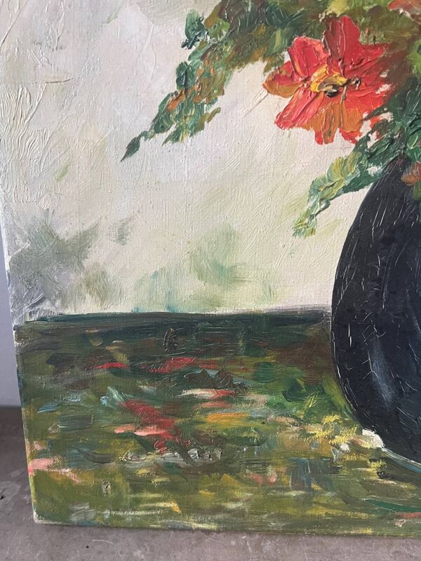Bouquet de fleurs dans un vase bleu, signé