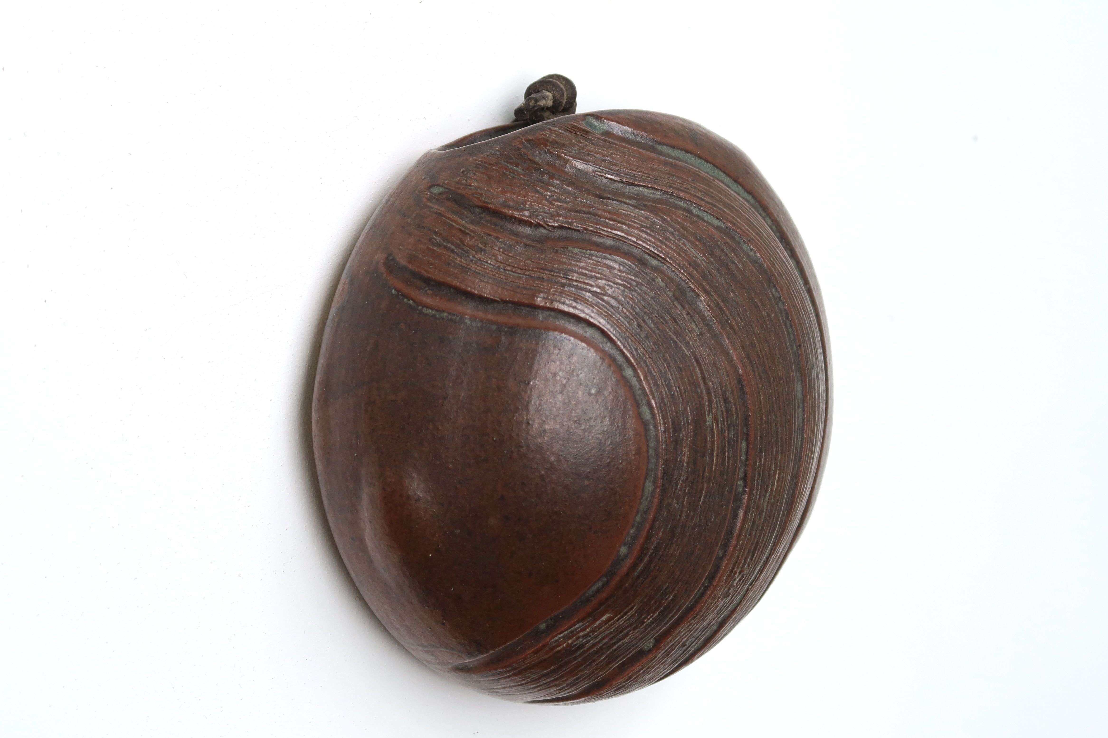 Ceramic "lens" wall vase signed Ama, 50s