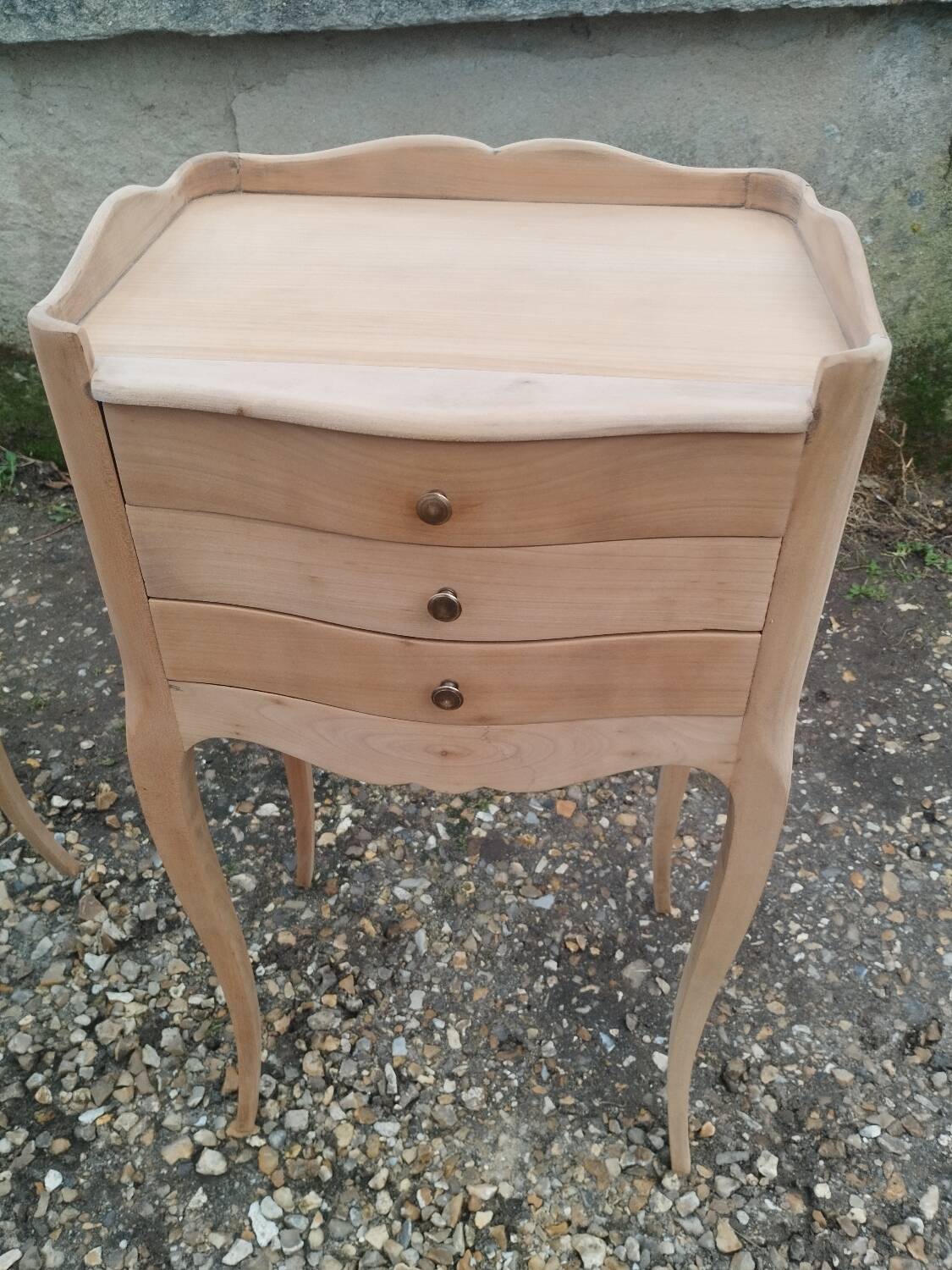 Pair of antique wooden bedside tables in Louis XV style.