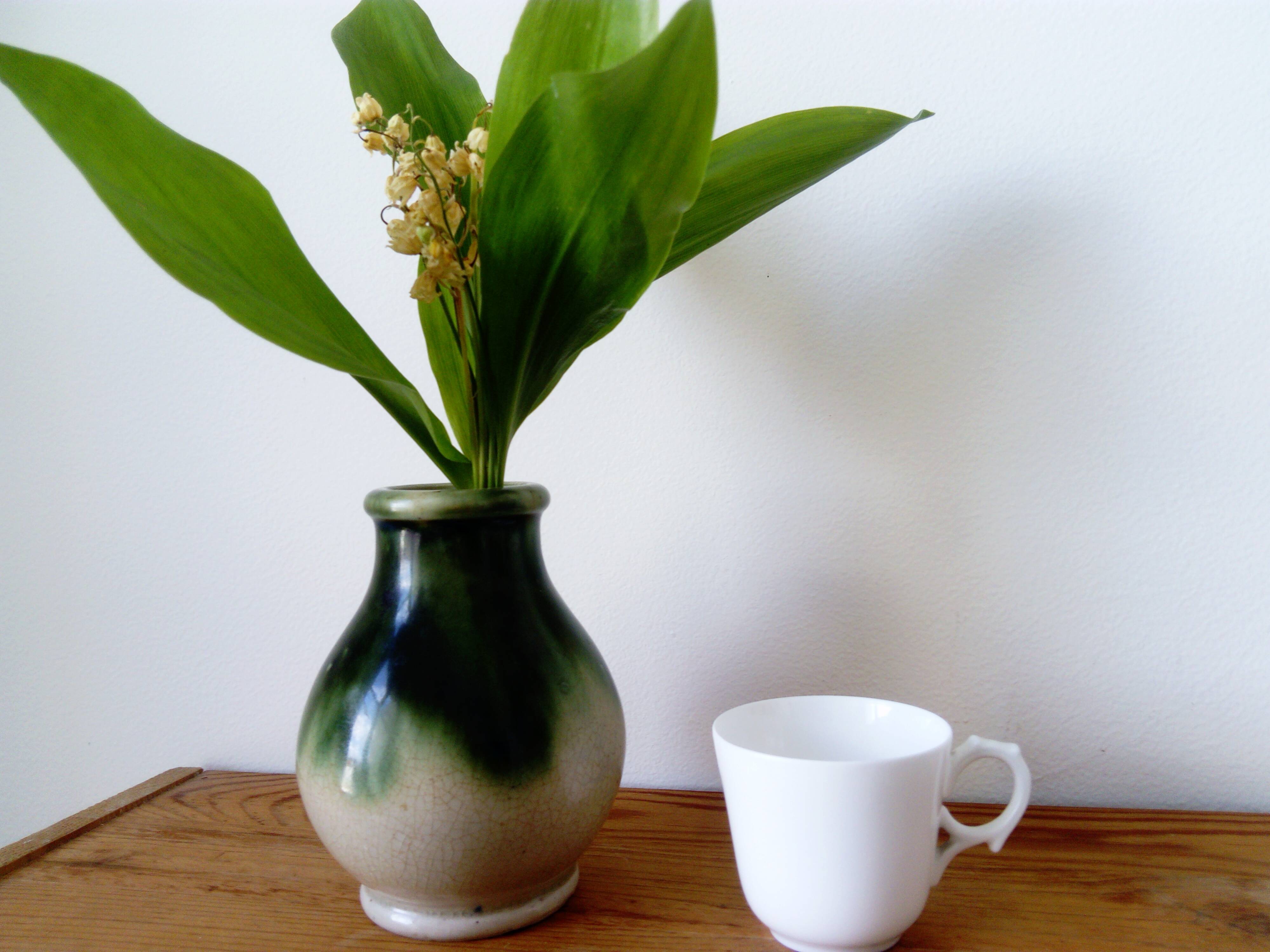 small green and cream glazed ceramic vase