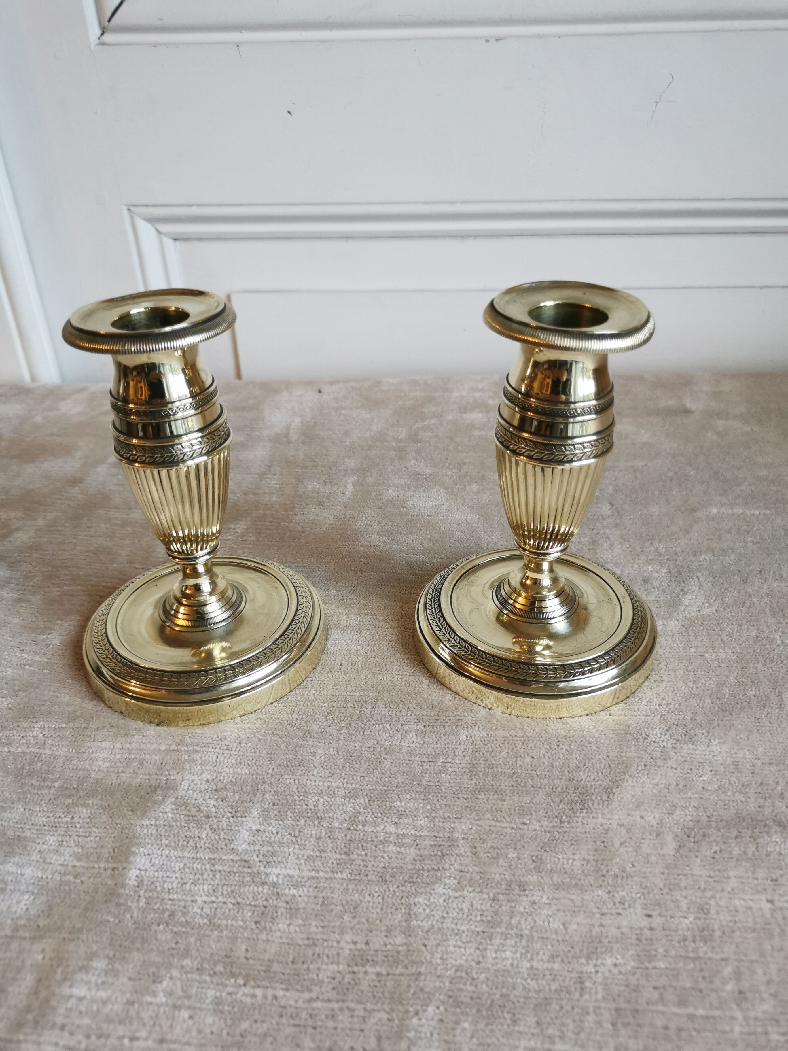 Pair of candlesticks in polished bronze Directoire d'époque