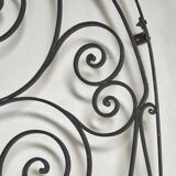 Arched wrought iron gate